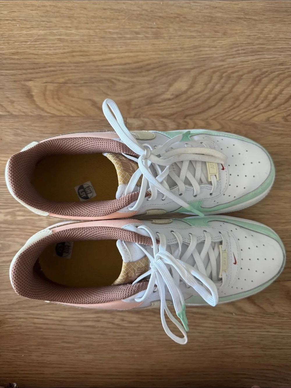 Nike White Sneakers with Mint Green & Peach Accents